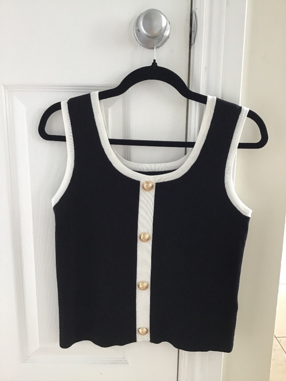 Beautiful black/white sleeveless viscose knit top with metal buttons size M